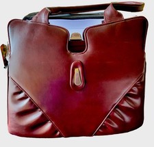Vintage Woman  s Maroon Leather Handbag, Double Straps, Clasp closure. Pockets.
