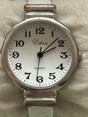 Eikon Silver Tone Women s White Cuff Band Watch