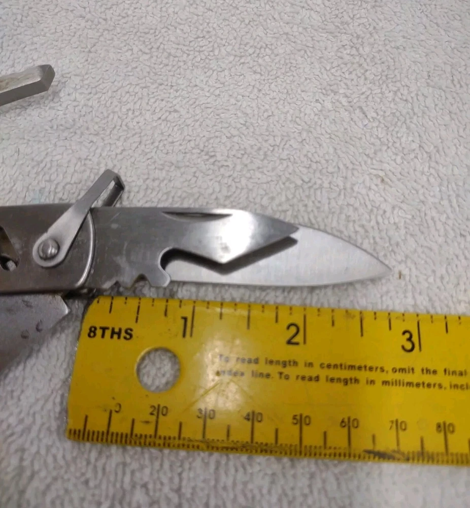 10-in-1 Stainless Steel Survival Multi-Tool with Knife Pliers Saw Screwdriver Bottle Opener 10-in-1 Stainless Steel Survival Multi-Tool with Knife Pliers Saw Screwdriver Bottle Opener