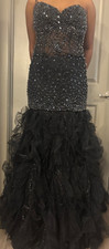 Black with black and silver beading Jovani designer evening dress. 