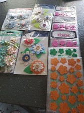 Lot of flowers different brands some foam some paper some cloth fun to use