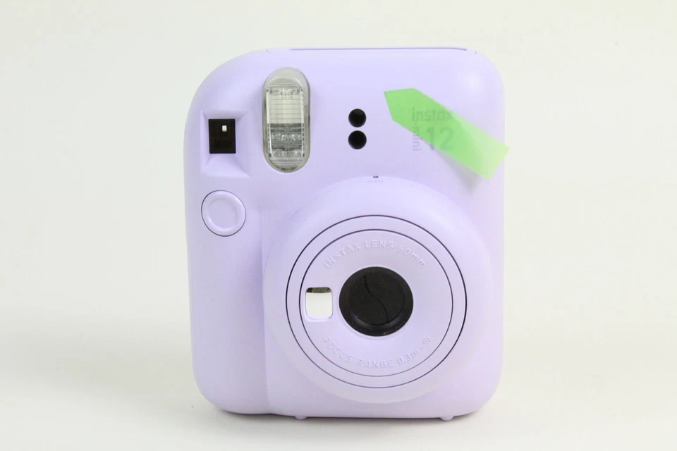 PAQUETE FUJIFILM INSTAX MINI 12 | 600024598 | PÚRPURA LILA | CAJA NUEVA ABIERTA DAÑADA Foto 2 de 4