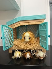 Little Live Pets Mama Guinea Pig with Hutch and 3 Surprise Babies