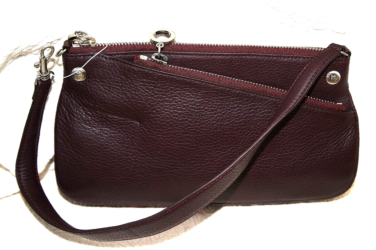 Etienne aigner wristlet 2025