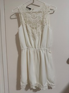 Bebe off white lace trim lined romper size XS