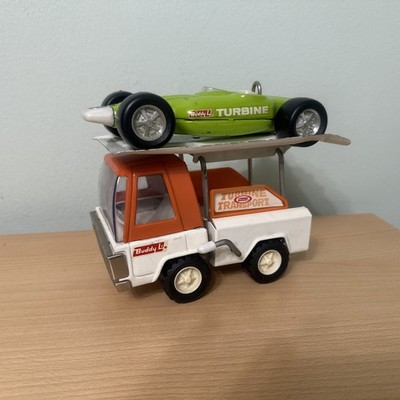 BUDDY L JAPAN TRUCK TURBINENTRANSPORTER PLUS RENNWAGEN ORIGINAL GEBRAUCHT