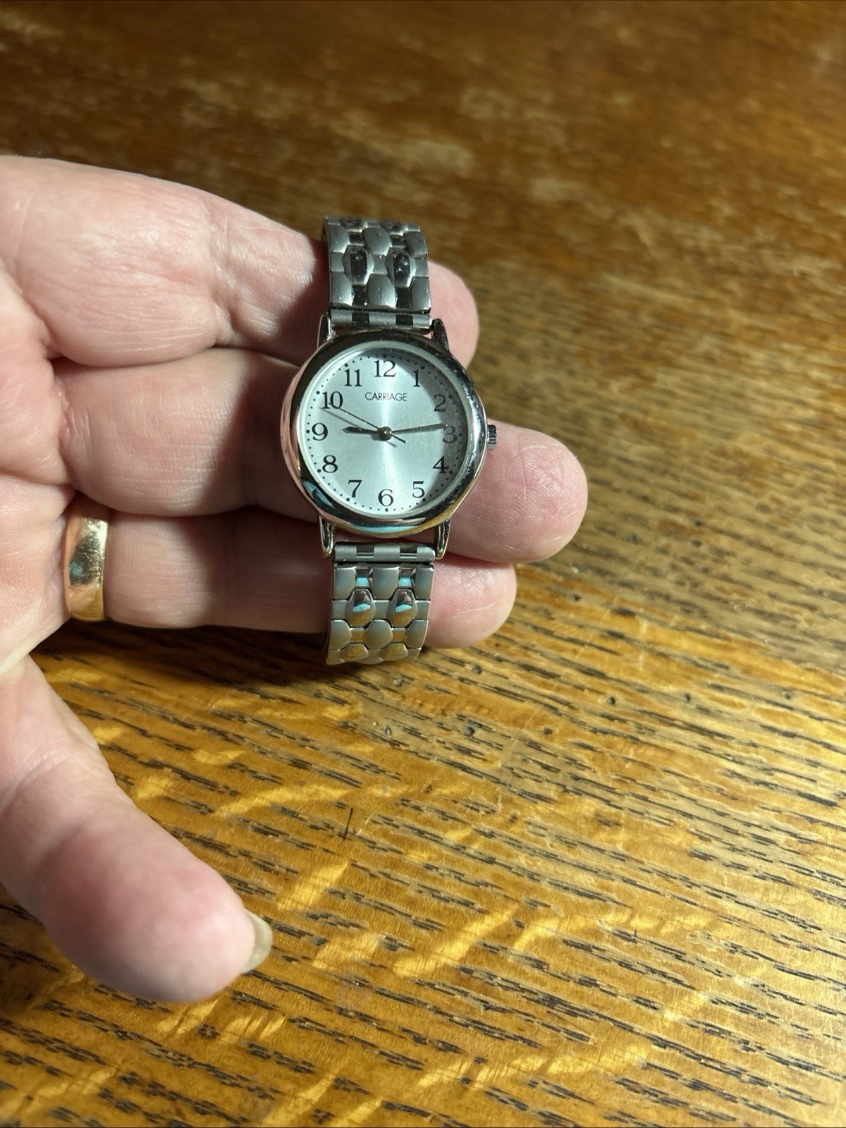 Timex Ladies Silver Tone Quartz Watch with Round Face and Stretch Band