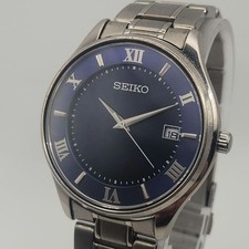 Seiko Solar Roman Date Men's Watch Titanium V157-0CZ0 Blue