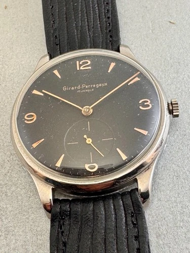 VINT Girard Perregaux black  extremelly   dial  wind up swiss made   ca 55