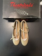 Theatricals tan leather character dance shoes featuring an ankle strap heel