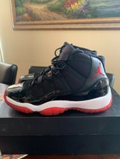 jordan 11 red and black grade school