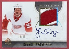 2010-11 SP Authentic - Johan Franzen #47 Limited Autograph Patch /25 (AU, MEM)