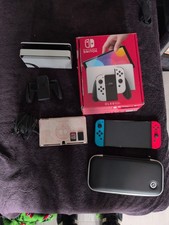 Nintendo Switch OLED 64GB White + Blue/Red Joy-Cons, Mario Kart 8 & Minecraft