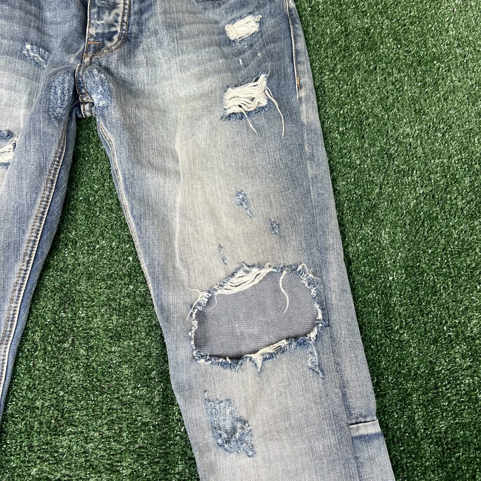 Pantalones de mezclilla Fear of God para hombre 34x34" azules desgastados ajustados cremallera al tobillo cuarta colección Foto 3 de 4