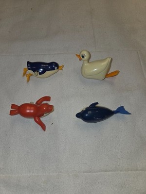 Vintage Tomy 1977 Wind Up Duck, Penguin, red Seal, Blue Dolphin working toys