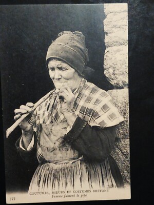 29-BRETONNE''.CUSTOMS, WOMAN SMOKING PIPE''.circa 1910.'' No writing.''