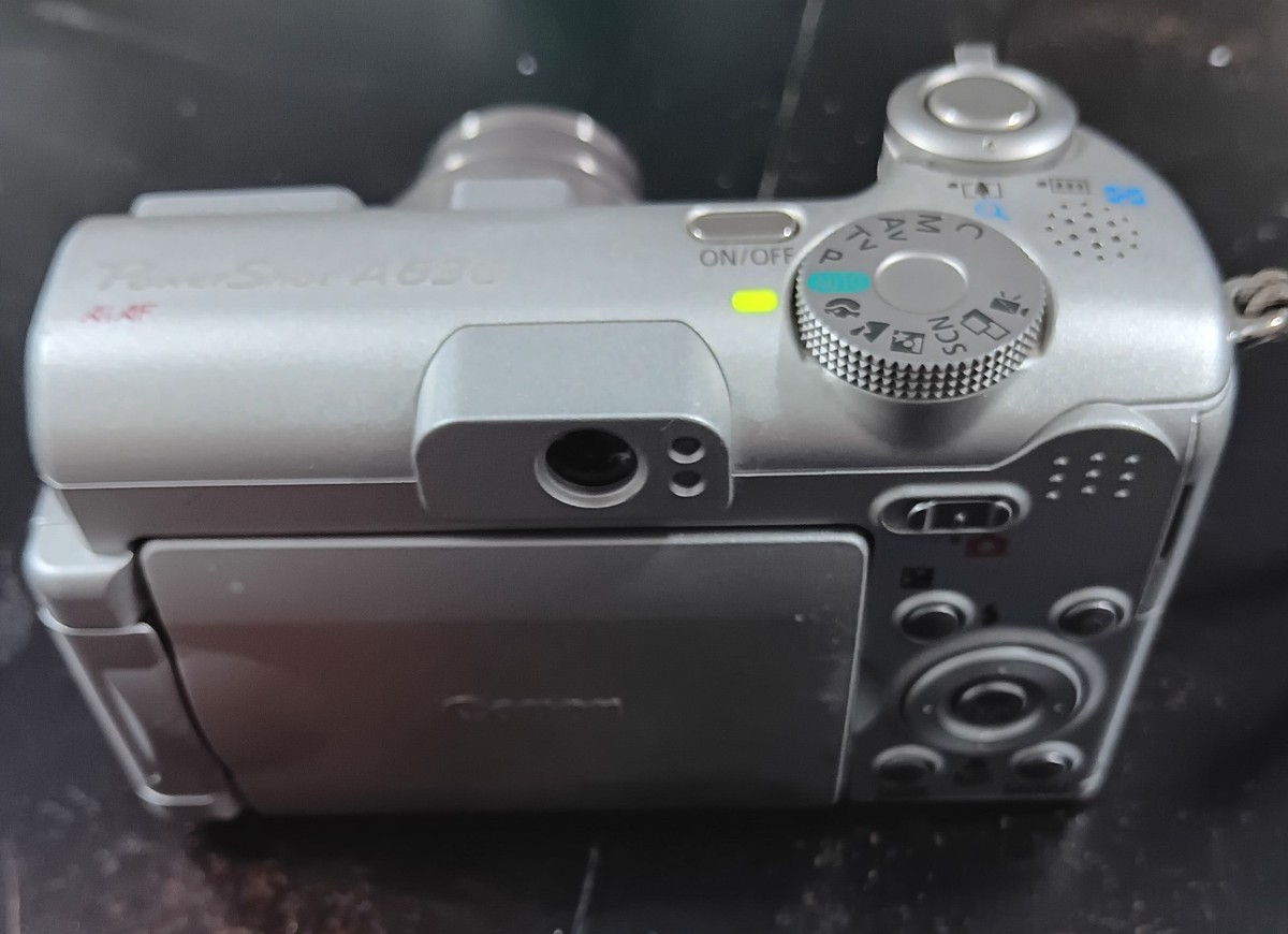 Canon PowerShot PC1201 360 Digital Camera 8MP, Silver,4 AA