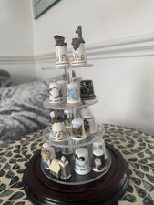 21 thimbles On Plastic Shelves Display Stand