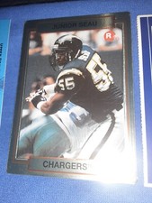 1990 ACTION PACKED #38 JUNIOR SEAU ROOKIE CARD GOLD FOIL CHARGERS MVP HOF NFL. rookie card picture