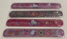 LOT OF 4 - Hello Kitty 2013 Slap Band Bracelets NEW IN PACKAGE