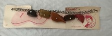 Vintage 1956 Elvis Presley Charm Bracelet Original Red Print Backing