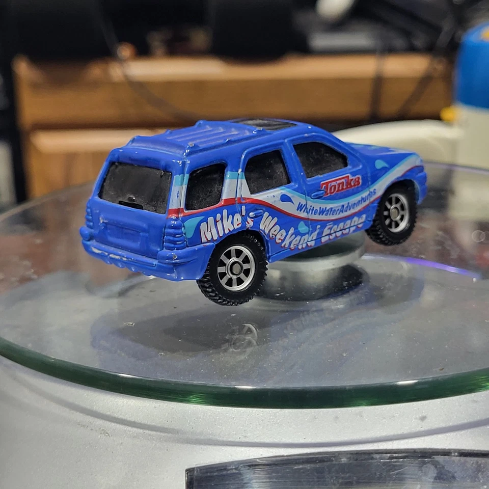 Ford Escape Tonka Mike's Weekend Escape 2000 Maisto 1/64 vintage coche azul TC-303 Foto 3 de 4