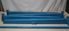 Set of four blue mounting beams with cross post, 36 inches by 2 inches by 2 in