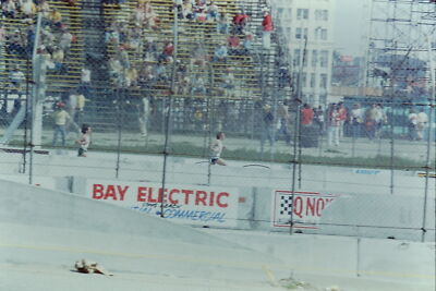 Vintage Found Slide Photo 1970s Racetrack crowd scene 1970s cars speeding by