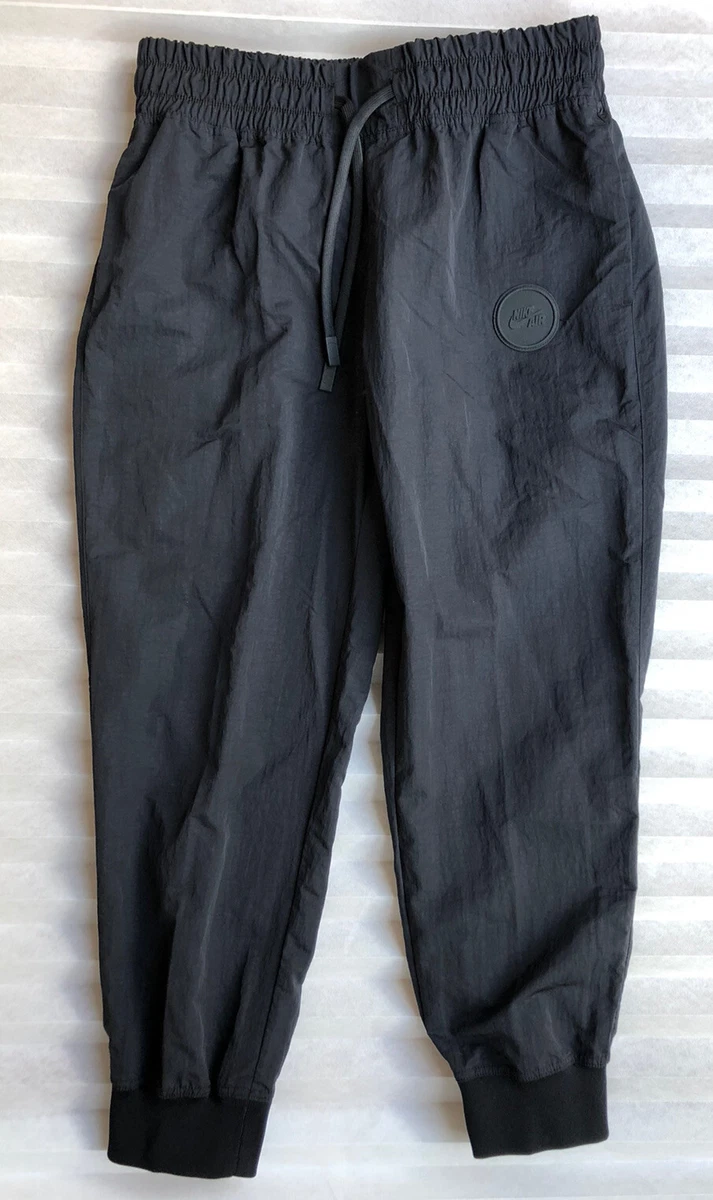 Nike Air Women s Nylon Pants Trousers 885323 010 Black Size L New