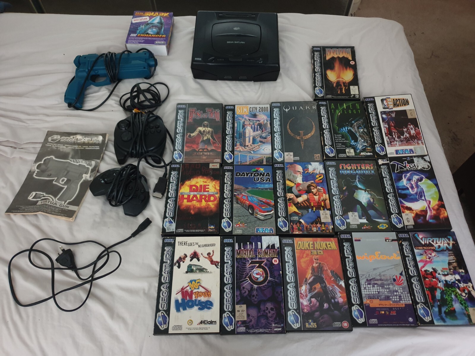 Sega Saturn Bundle 2 Controllers, Light Gun, 16 Games, Gameshark eBay