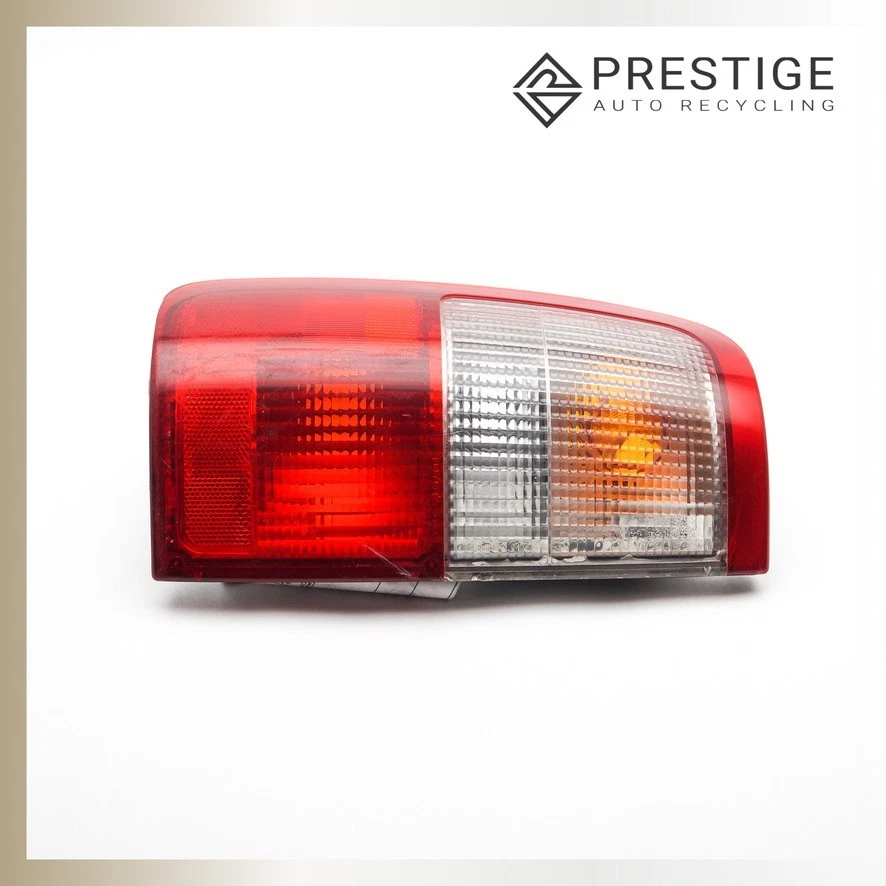 Conjunto de luz trasera izquierda Toyota T100 1993-1998 81560-34010 OEM Foto 3 de 4