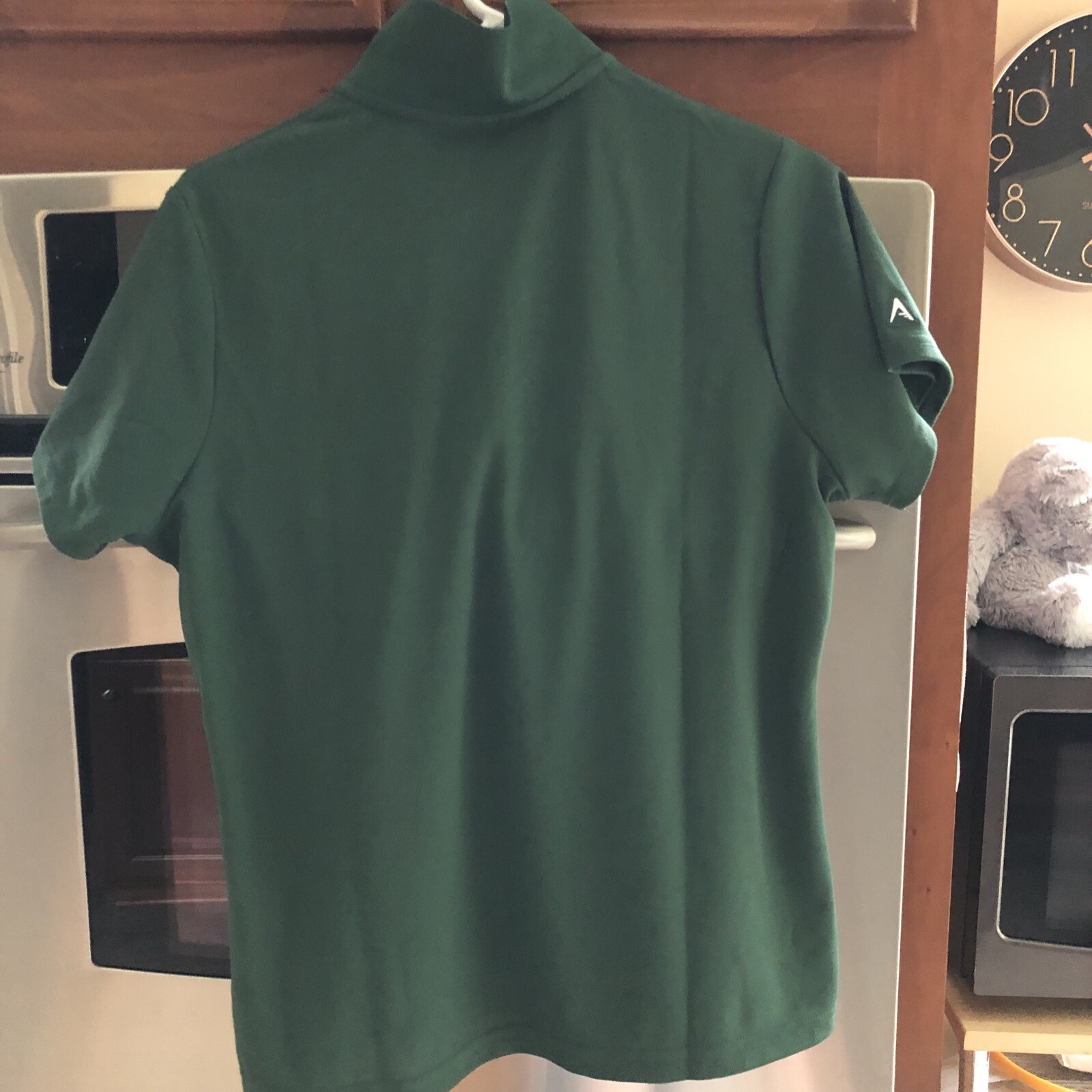 Antigua Women’s Golf Polo Shirt (WGAP on sleeve) forest green, size L
