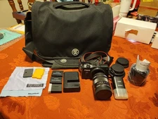 Canon EOS M 18.0 MP Compact Systems Camera with EF-M18-55mm is STM Lens + Extras