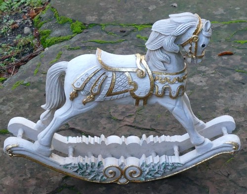 Antique wooden rocking horse ( 16X12”) Christmas themed (missing one ear)