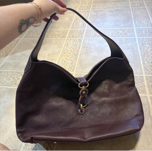 Brand New Dooney & Bourke Pebble Grain Logo Lock Shoulder Bag in Rich plum wine