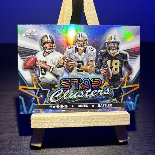2024 Topps Cosmic Chrome Star Clusters New Orleans Saints Brees Manning Rattler - 第 1/2 張圖片