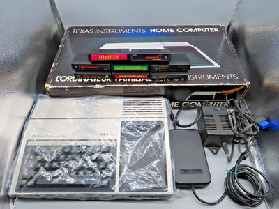 #SE5145#Vintage Texas Instruments TI99/4a Computer in OVP inkl. 8 Spiele *lesen*