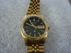 VINTAGE SEIKO SQ QUARTZ WATCH WOMENS DAY DATE BLACK DIAL GOLD TONE NEW BATTERY