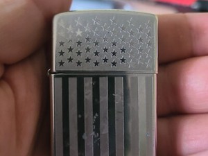 ZIPPO AMERICAN FLAG CIGARETTE LIGHTER, PRE-OWNED, HIGH POLISHED CHROME  2006