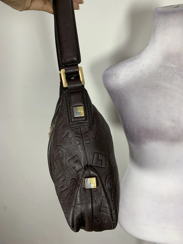 Bolso de hombro hobo a rayas de cuero en relieve L.A.M.B para mujer usado, pero parece nuevo Foto 3 de 4