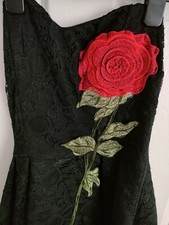 Beautiful  fulllined party ball gown size 8 in black with embroidered red rose 