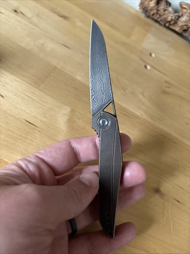CiViVi  Mckenna Damascus Blade Copper Handle Front Flipper. Light scratch