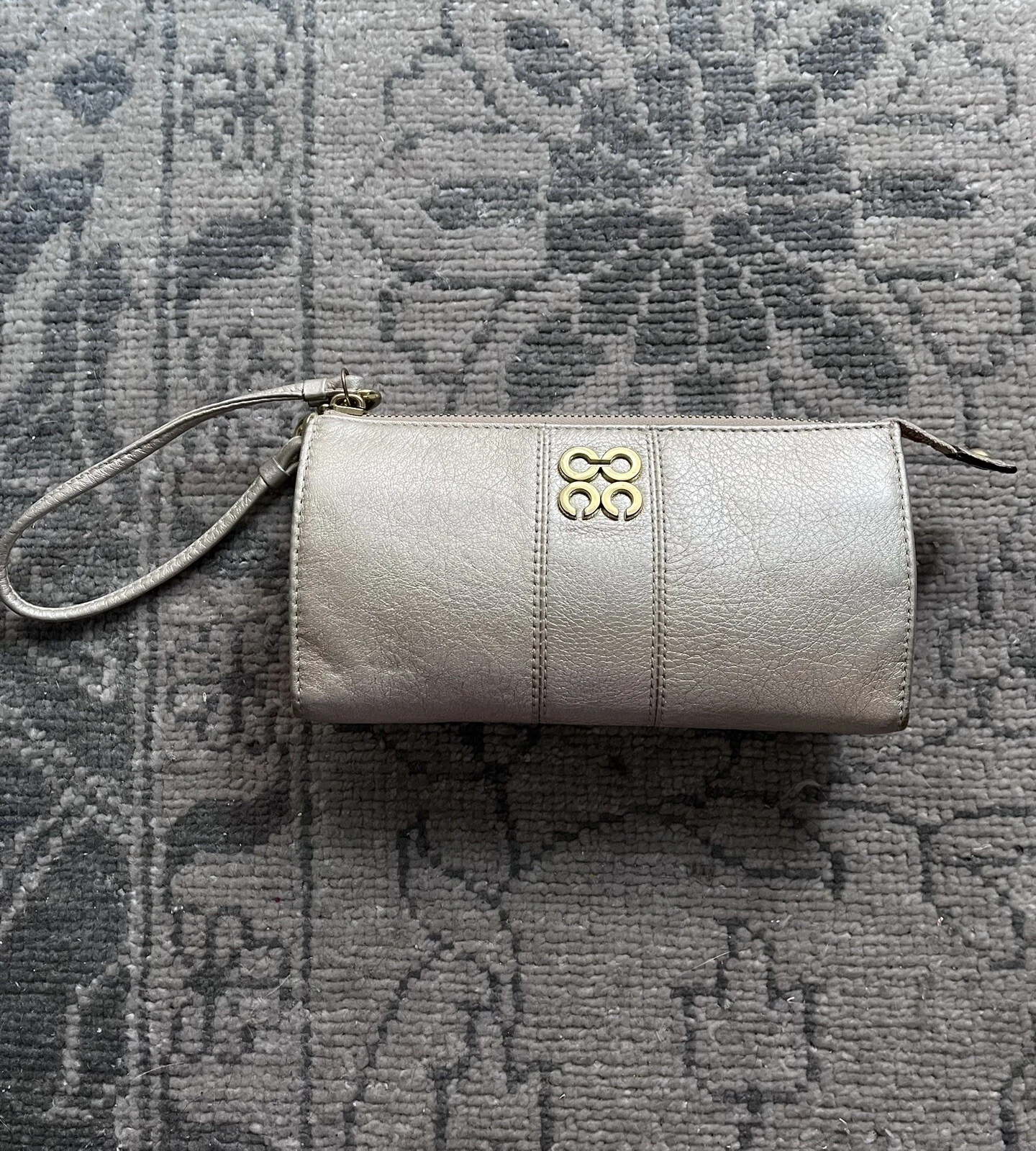 Polso Coach in pelle oro