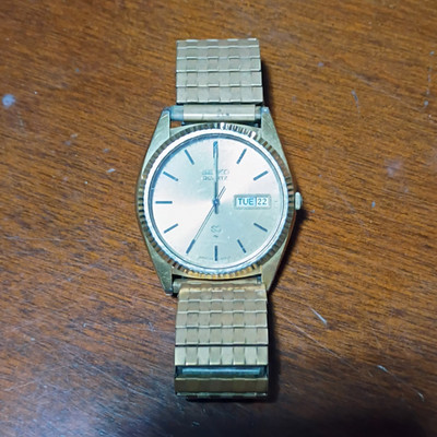 Seiko Quartz Men s Gold Tone Analog Dress Watch Day/Date Water-Resistant