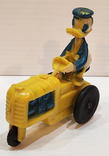 Vintage 1940's W.D.P. Hard Plastic Friction Car Donald Duck on Yellow Tractor