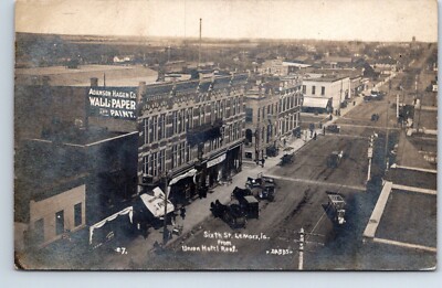 RPPC Real Photo Postcard Iowa Lemars 6th st Union Hotel Adamson Hagen Co Dabbs
