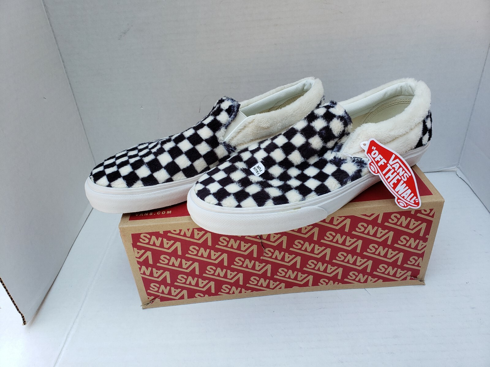 vans faux fur slip ons