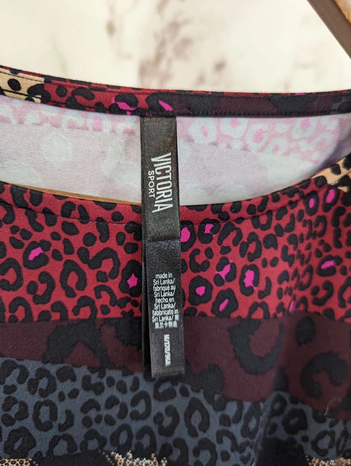 UNDERCOVER Abito Victoria Secret donna medio stampa animalier leopardato sportivo aperto dietro