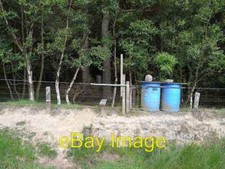Photo 6x4 Pheasant feeders in Catcherside Plantation Pheasant rearing is  c2009