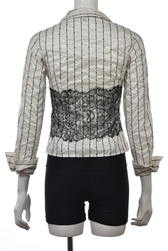 Blusa con botones de encaje floral blanca talla 0 de la colección Carmen Marc Valvo Foto 2 de 4